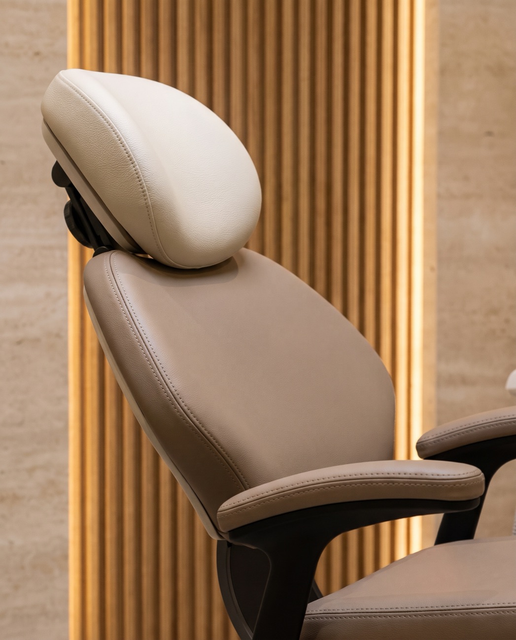 Close-up of a new dental chair with soft taupe upholstery
